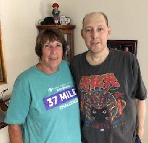 Janet Faggella Howard in a 37 Mile Challenge t-shirt and her son Bryan