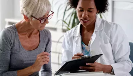 A doctor talking to her patient