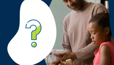 dad and daughter washing hands