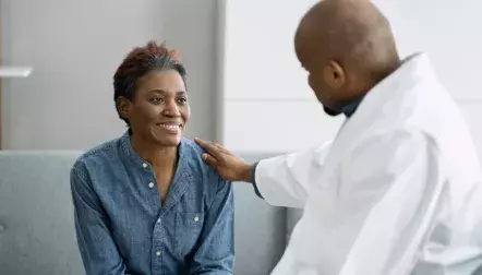 Doctor talking to black patient