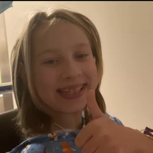 Hallie giving the camera a thumbs up