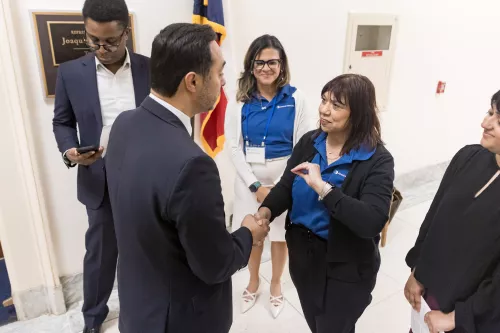 AKF Ambassadors: Ronnie Behrend, Michelle Osuna, Representative Joaquin Castro, Legislative Assistant: Eyole Mbongo, AKF Staff (in right corner): Mythili Shirhatti