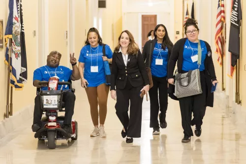 AKF Ambassadors going down the halls of Capitol Hill