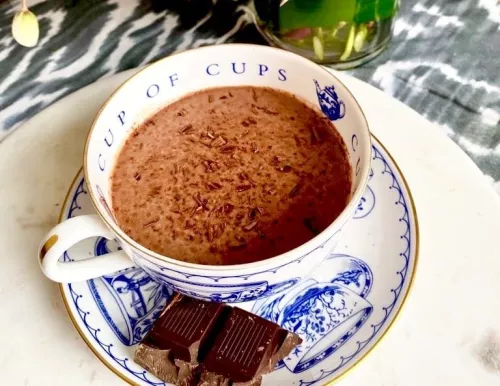 Cup of hot chocolate in a blue and white tea cup