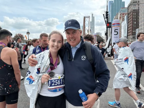 Ellie Hanley at the end of a race with her father John Hanley