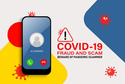 image with cell phone warning of covid-19 fraud and scams