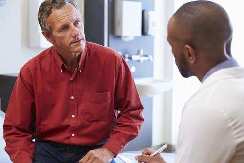 A patient talking with a doctor