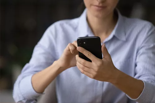 Woman texting on a phone