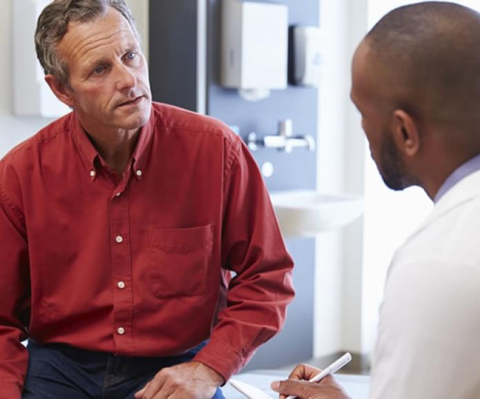 A patient talking with a doctor