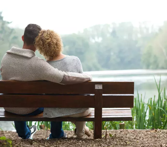 Couple sitting on bench