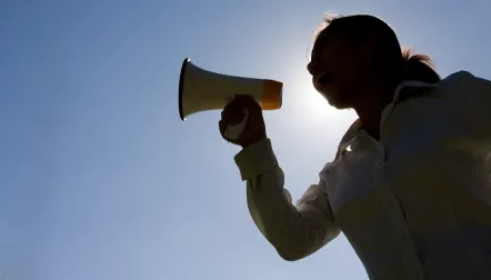 woman shouting megaphone silhouette