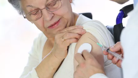 woman getting flu shot no masks
