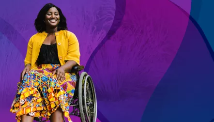 Smiling Black woman in a wheelchair