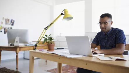 young black man in coworking space