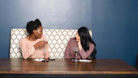 Copy of two women talk over martinis akfshoot