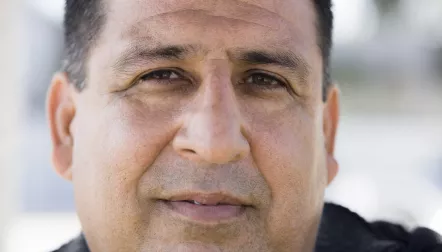 hispanic senior man closeup neutral