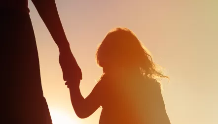silhouette parent child handholding shutterstock 483950449 silhouette parent child handholding shutterstock 483950449